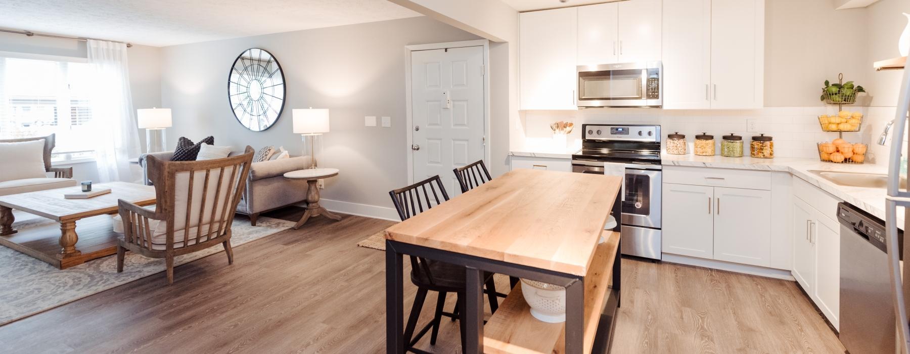 a kitchen with a wood floor