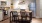 a kitchen with a table and chairs