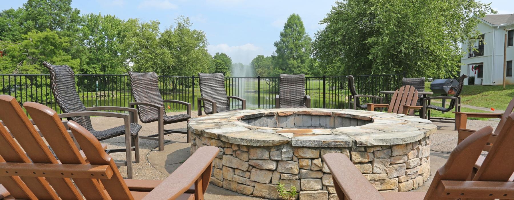 a patio with chairs and tables